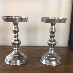 Two candleholders